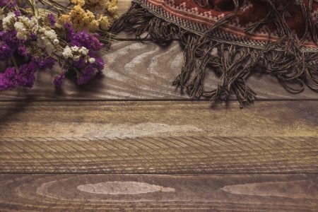 ornamental-blanket-near-bouquet